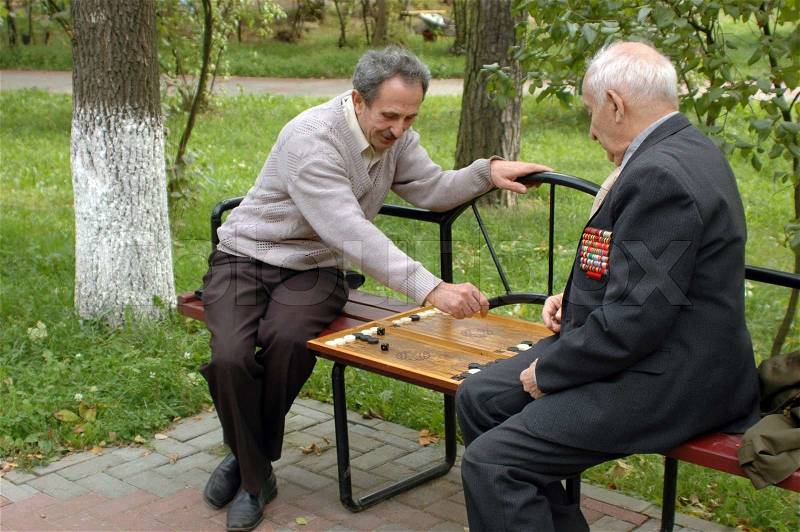 Two old men playing backgammon 2, stock photo