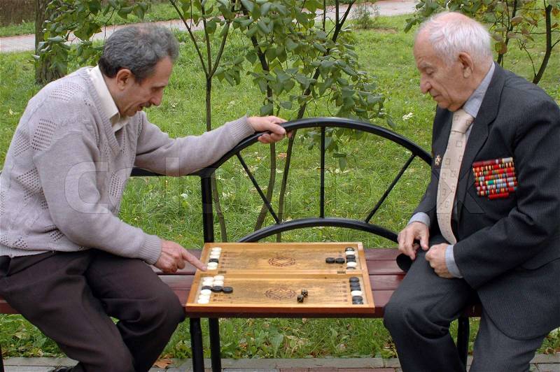Two old men playing backgammon 4, stock photo