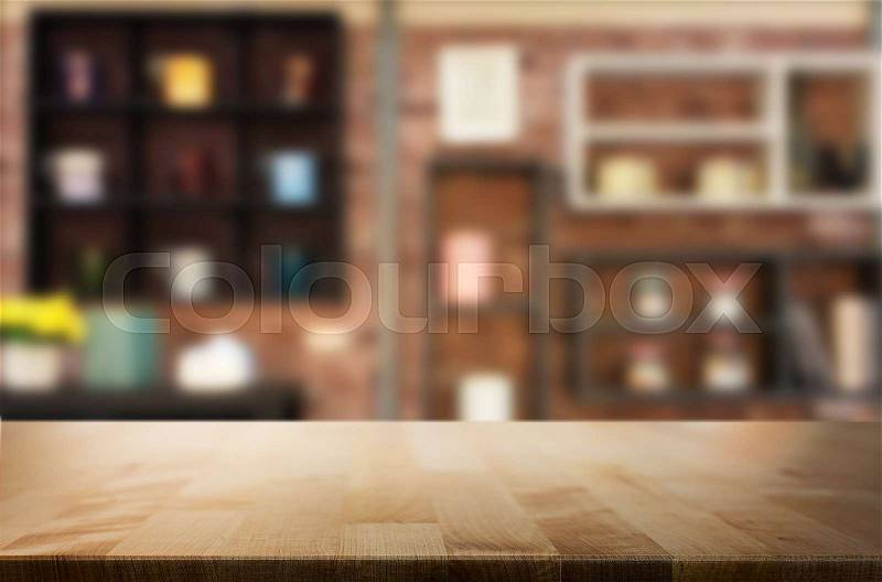 Wooden board empty Table Top And Blur Interior over blur in coffee shop Background, Mock up for display of product, stock photo