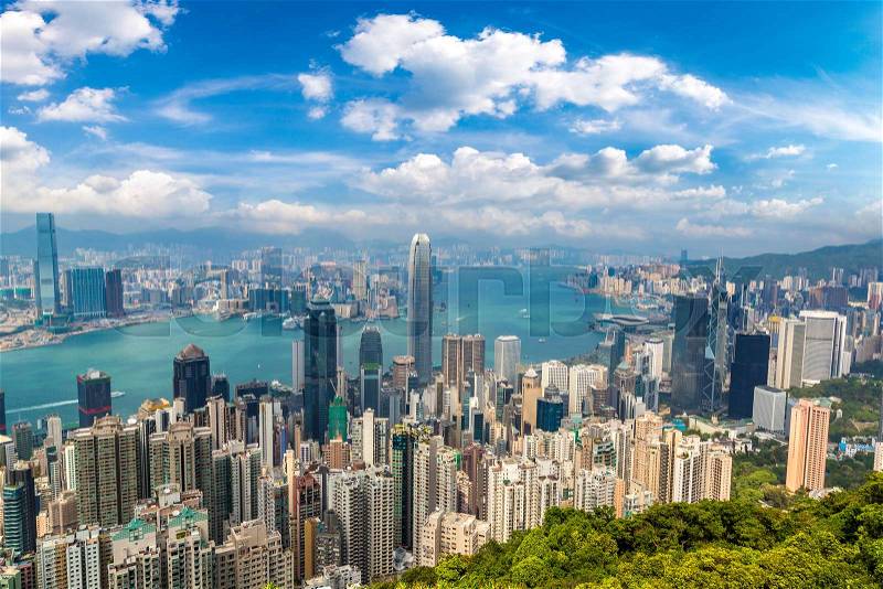 Panoramic view of Hong Kong business district in a summer day, stock photo