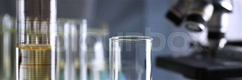 Yellow liquid spilled petrol additive innovative supply. Conveyor line production household cleaning products detergents help cleaning destruction stains pests urine ..., stock photo