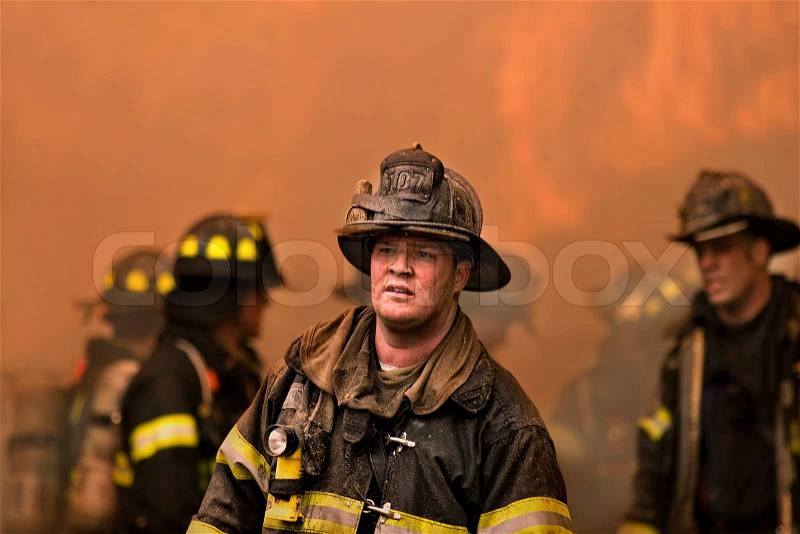 Queens, NY- March19: Firefighters. Wind-Fueled Fire Destroys 11 Homes. March 19 2009 -Queens, NY, stock photo