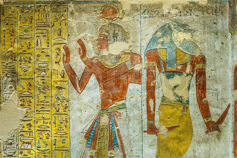 Ancient egyptian painting of two gods in a tomb in the valley of the kings, the tomb of Tausert and Setnakht, Luxor, Egypt, October 21, 2018, stock photo