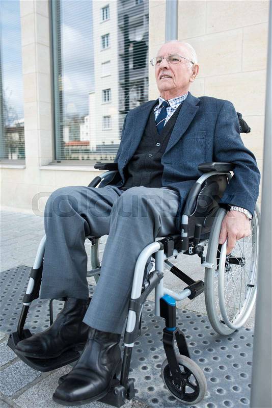 Elderly handicapped man, stock photo