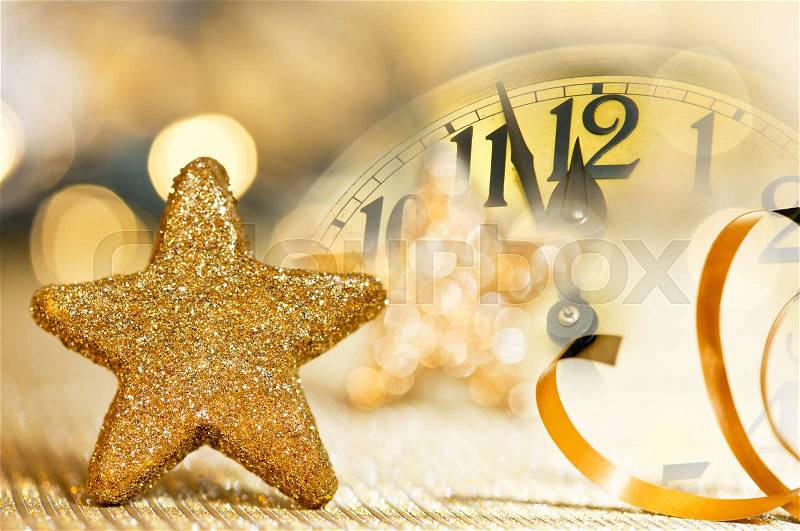 Clock face before midnight on the New year eve, stock photo