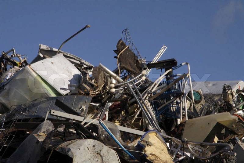 A huge pile of metal waste at a recycling center, stock photo