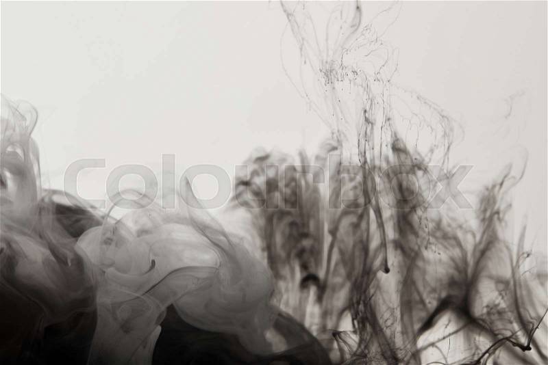 Abstract black and white background with paint swirls, stock photo