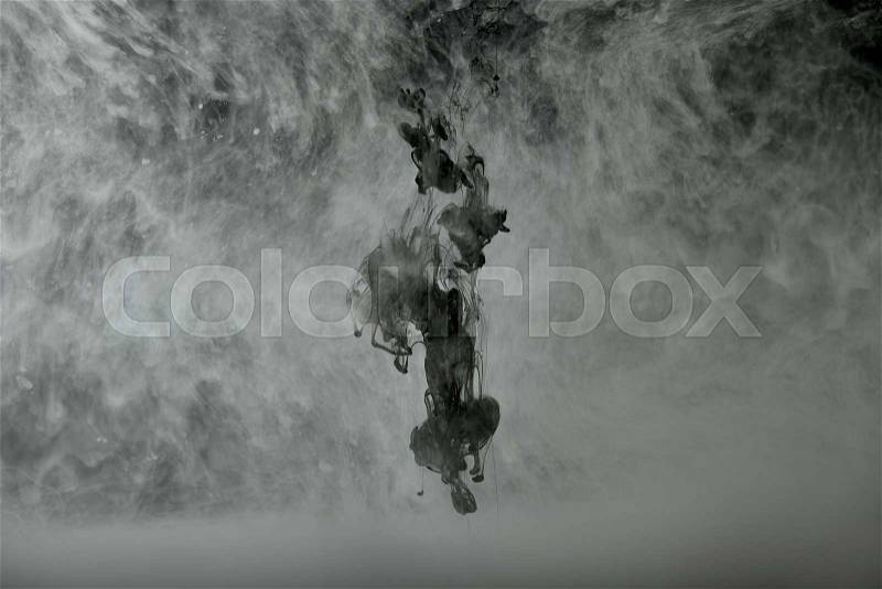 Background with black and white swirls of paint, stock photo