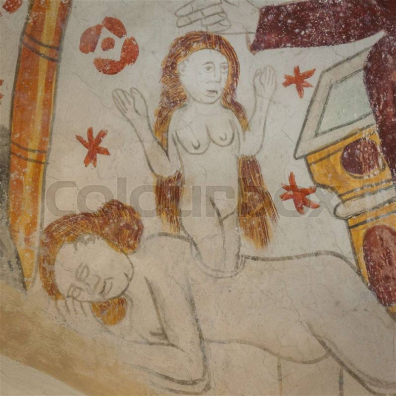 Creation of Eve from the rib of Adam and the blessing hand of God the Father, an ancient gothic mural in Aspo church, Sweden, August 13, 2009, stock photo