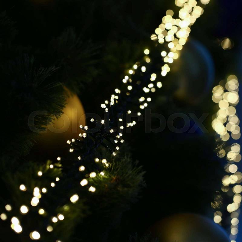 The path of the river of Christmas lights blurred background, stock photo