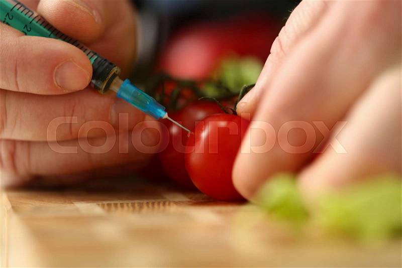 Cook in kitchen introduces secret ingredient to tomato flavor enhancer better perception sensations explicit health care guarantees scheme concept, stock photo