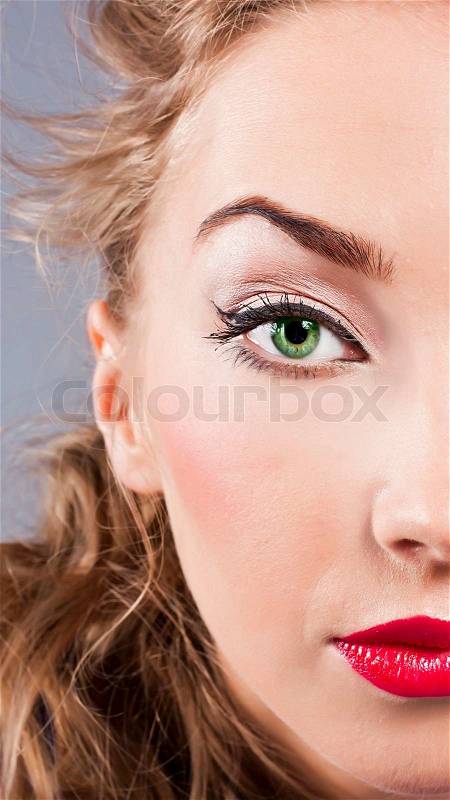 Portrait of young beautiful blond girl with stylish make-up, stock photo