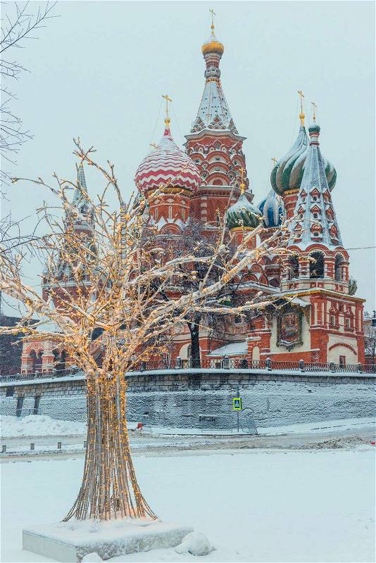 Attraction St. Basil\'s Cathedral on Red Plozadi in Moscow, Russia. Winter view of the architecture of the temple, stock photo