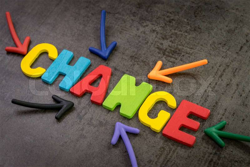 Change management, business transformation or move before disruption concept, multi color magnet arrows pointing to the word CHANGE at the center of dark black ..., stock photo