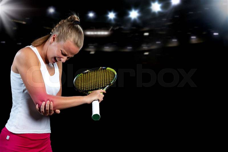 Tennis woman player with injury holding the racket on a tennis court, stock photo
