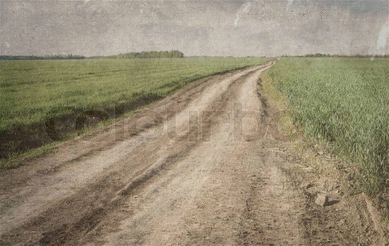 Road and field, old photo with stains, stock photo