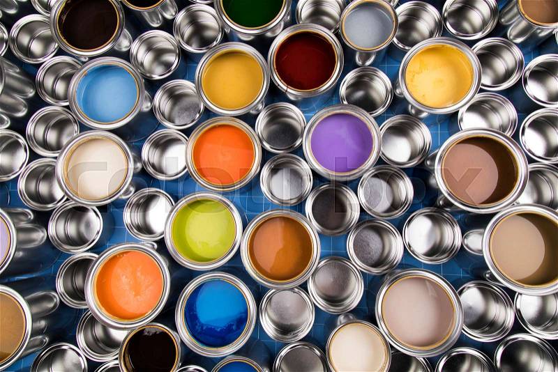 Metal tin cans with color paint, stock photo