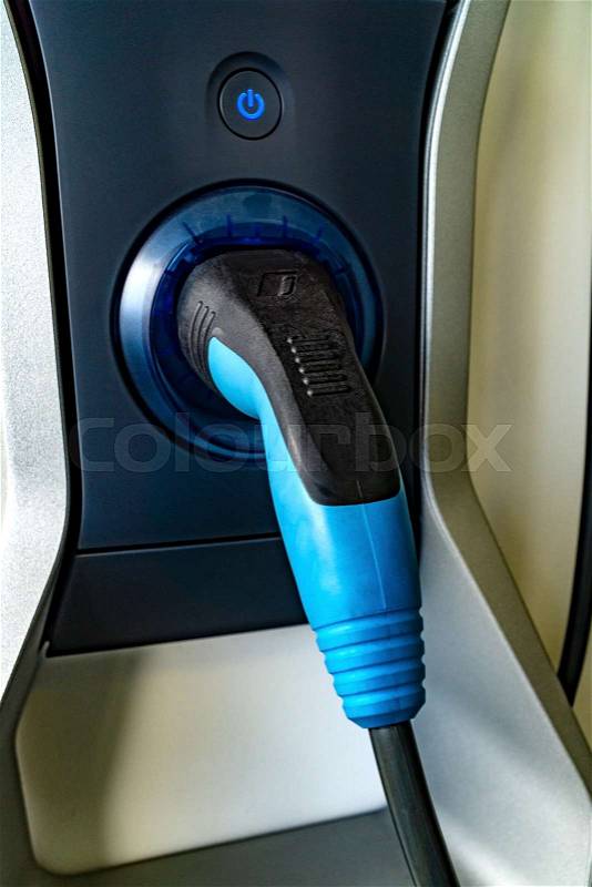 Car electricity charger in detail with Power Button, stock photo