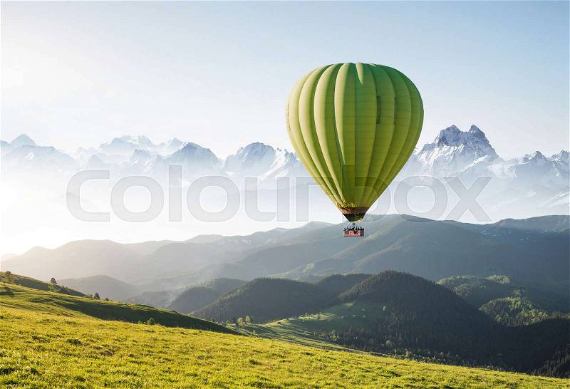 Air ballon above mountains at the summer time. Concept and idea of adventure, stock photo