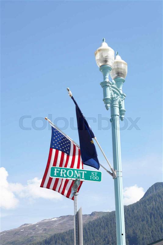American And European Union Flags Flying From Lamp Post, stock photo