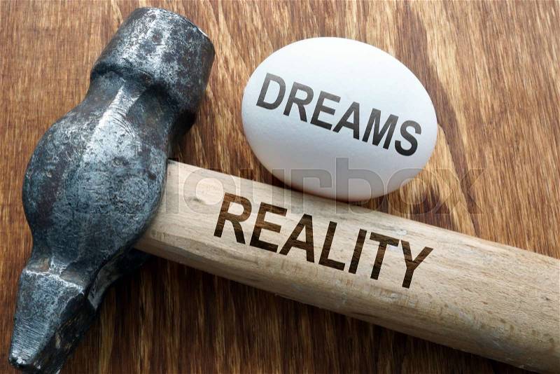 Broken dreams from reality concept. Hummer and egg, stock photo