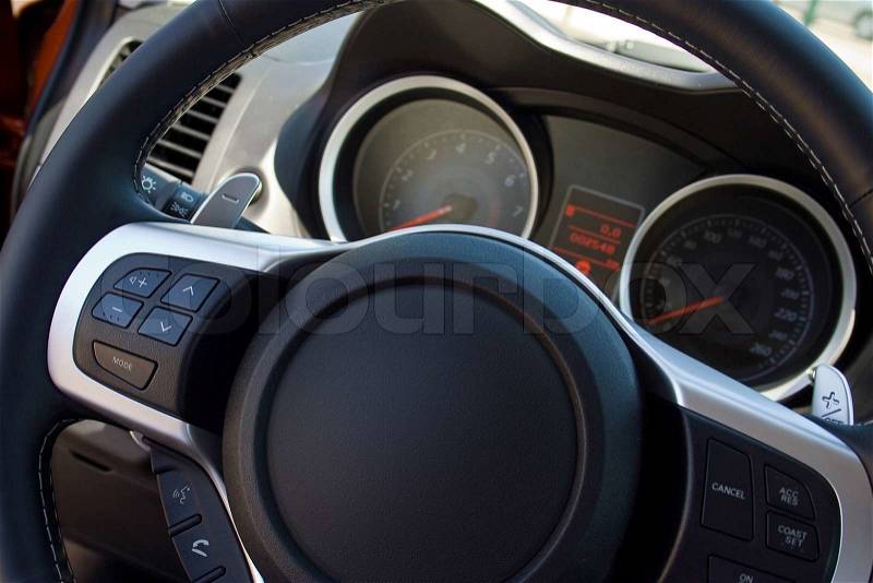Car steering wheel and instrument panel, stock photo