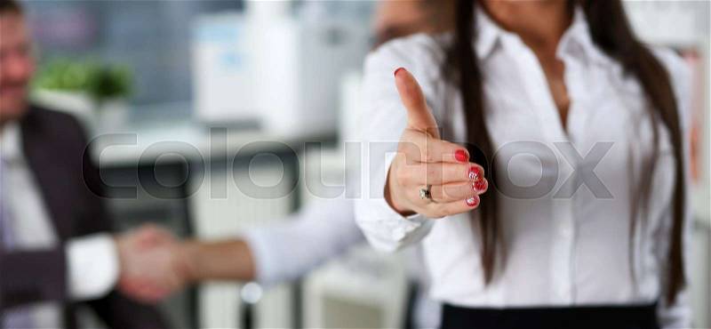 Woman in suit give hand as hello in office closeup. Friend welcome mediation offer positive introduction thanks gesture summit participate executive approval ..., stock photo