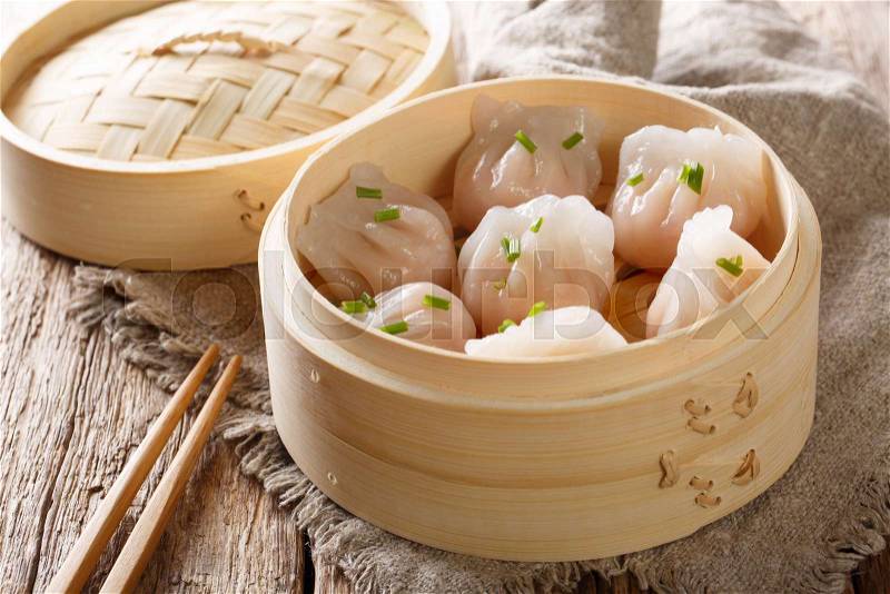 Steamed shrimp dumplings dim sum close-up on the table. horizontal, stock photo
