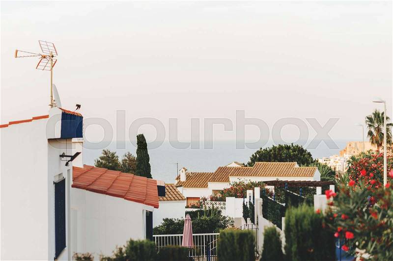 Roofs of mediterranean seaside villas, image taken in Peniscola, Valencia, Spain, stock photo
