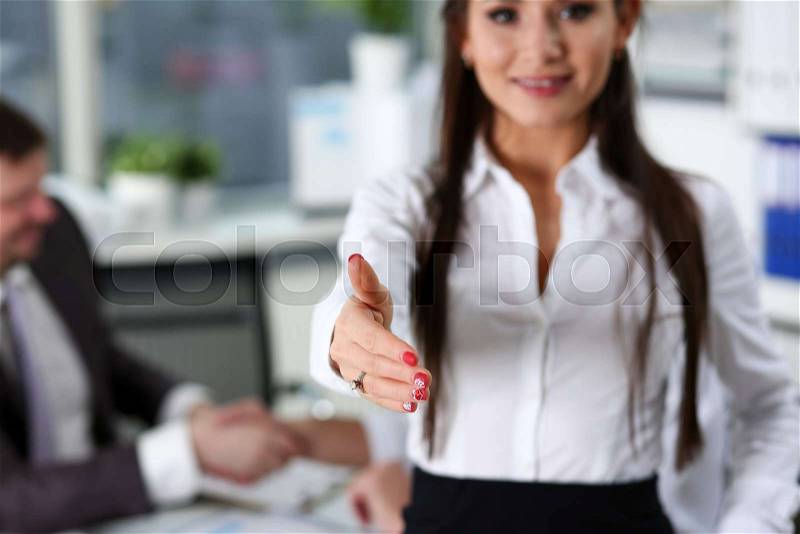 Woman in suit give hand as hello in office closeup. Friend welcome mediation offer positive introduction thanks gesture summit participate executive approval ..., stock photo