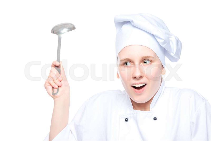 Portrait of an emotional chef in cap with a ladle on white background isolated, stock photo