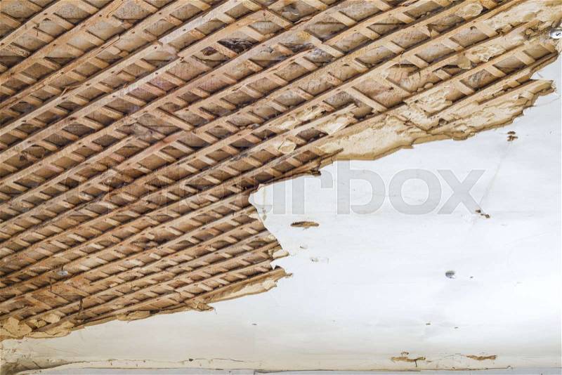 Ceiling before repair. Old wall destroyed decor background. Architecture texture design, stock photo