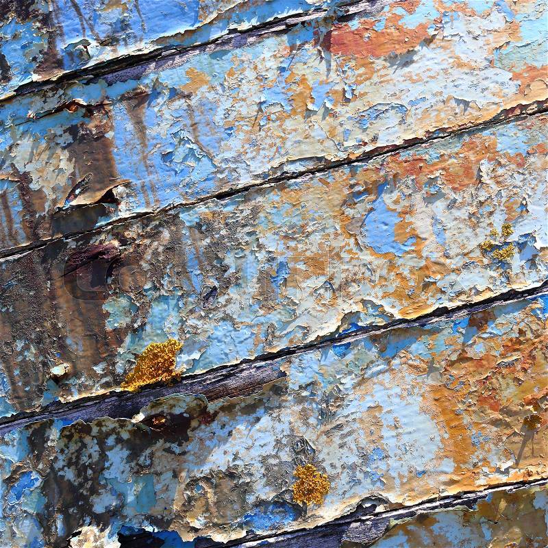 Boards of old boat with peeling paint background texture, stock photo