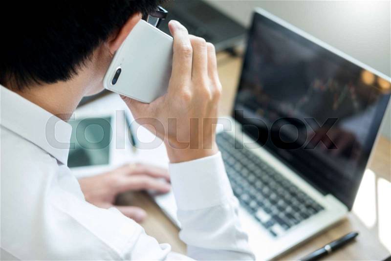 Broker working trading do this deal gesturing on a stock market exchange on laptop Management customer Account Concept, stock photo