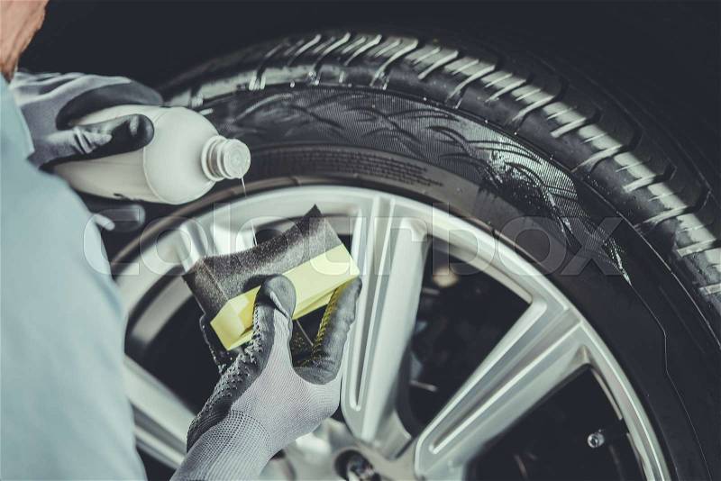 Modern Car Tires and Alloy Maintenance. Detailed Vehicle Cleaning Service. Automotive Concept, stock photo