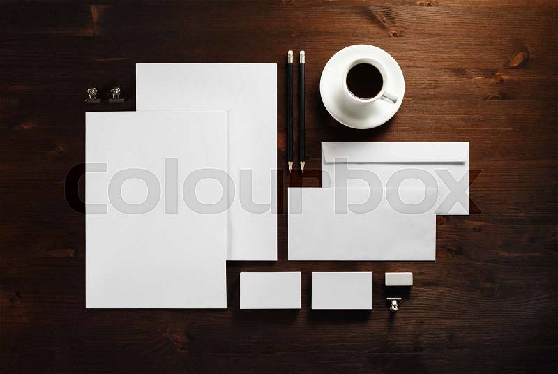 Blank corporate stationery set on wooden background. Template for branding identity. Flat lay, stock photo