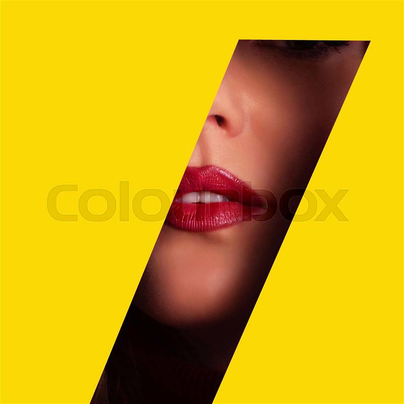 Girl with bright make up, red lipstick looking through hole in yellow paper. Make up artist, beauty concept. Square crop. Cosmetics sale. Beauty salon advertising ..., stock photo