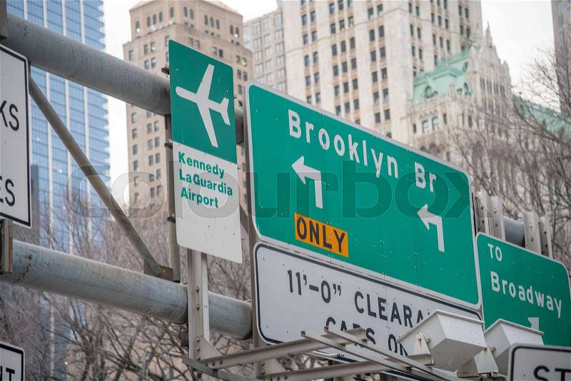 Brooklyn Bridge and Airports street signs in New York City, stock photo