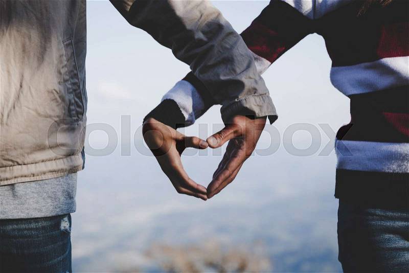 Valentine couples walking hand in hand, promised to take care of each other with love and caring. Lovers love concept, stock photo