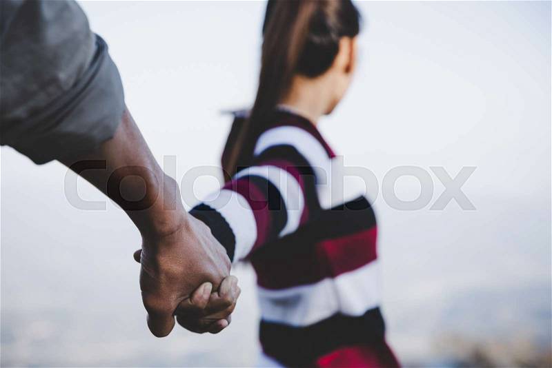 Valentine couples walking hand in hand, promised to take care of each other with love and caring. Lovers love concept, stock photo