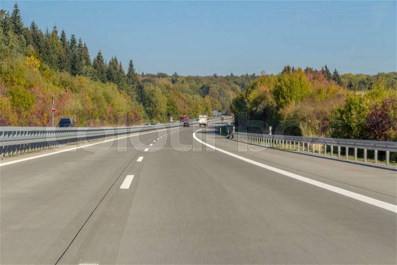 Sunny scenery showing a highway in Germany at autumn time, stock photo