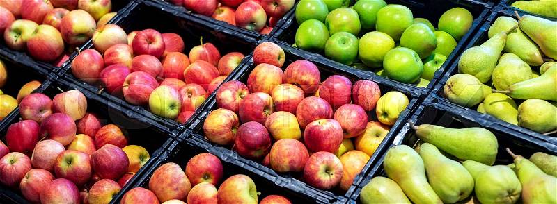 Orchard product fruit banner. Grocery supermarket store. Shelves with variety of different orgnaic fresh ripe pears and apples. Vegetable and fruit market, stock photo