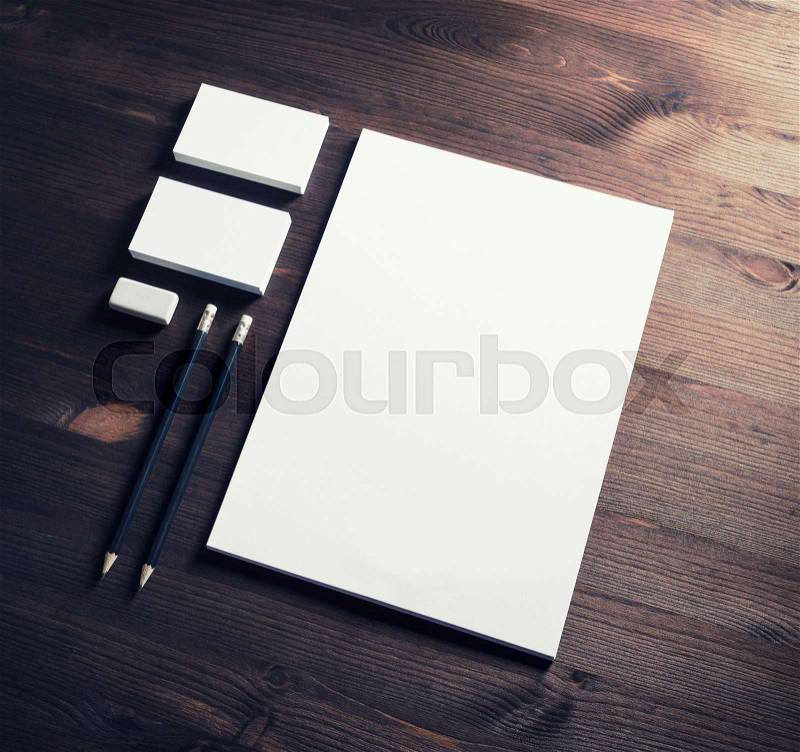 Corporate stationery template. Blank letterhead, business cards, pencils and eraser. Branding mock-up, stock photo