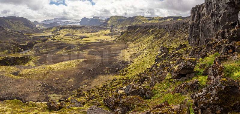 Rocky volcanic nature landscape of Landmannalaugar in Iceland on Laugavegur trek. Green Nordic summer on hiking trail, stock photo