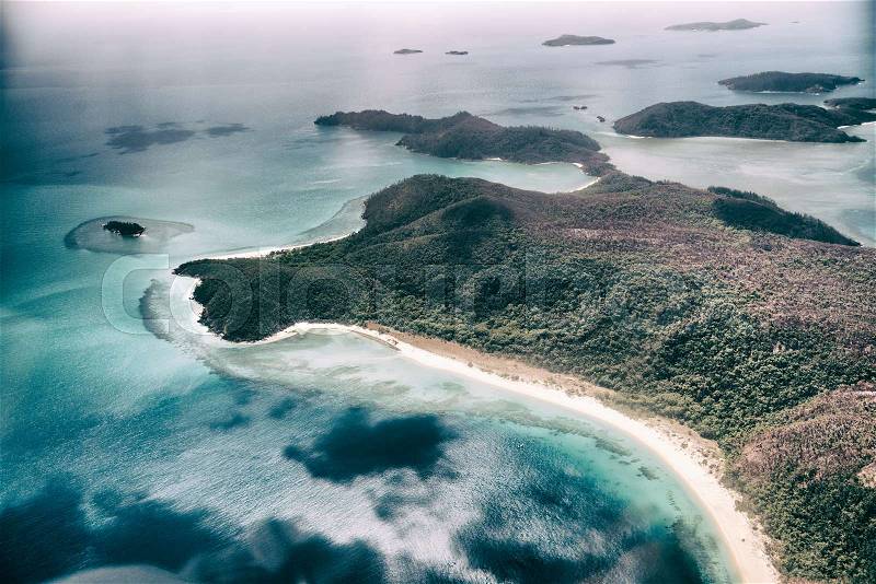 Aerial overhead view of Whitsunday Archipelago on a beautiful sunny day, Australia, stock photo
