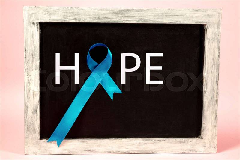 Blue ribbon symbolic of prostate cancer awareness campaign and men\'s health in November. The cancer, health, breast, awareness, campaign, disease, help, care, ..., stock photo