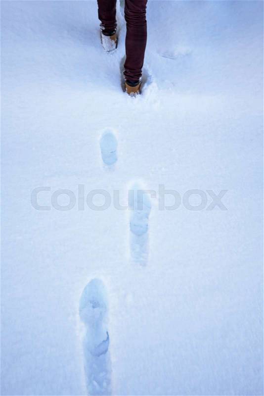 Snow texture with foot prints on winter time, stock photo