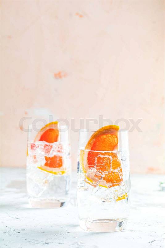 Grapefruit gin and tonic selection drink alcohol cocktail or detox water, refreshing drink with ice,, stock photo
