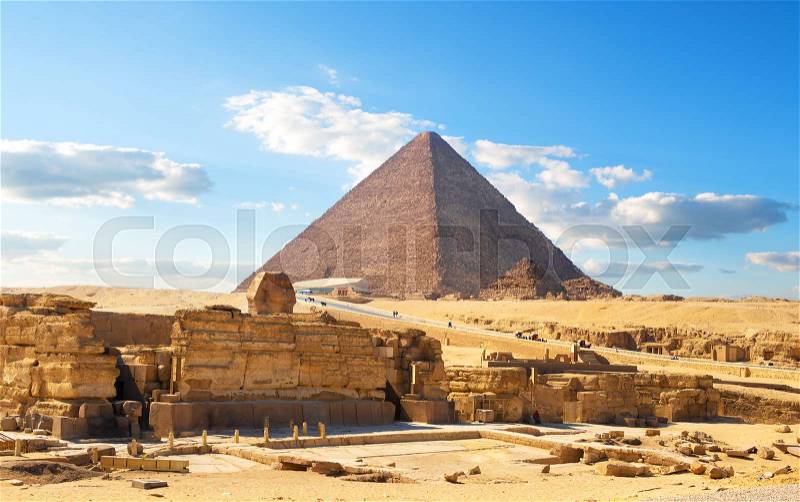 Egyptian pyramids in sand desert and clear sky, stock photo
