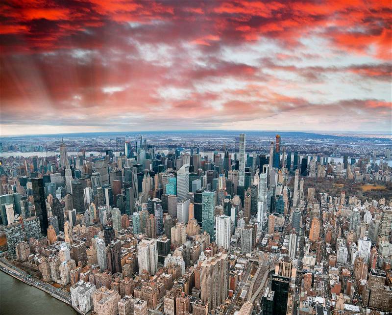 New York City from the sky, Manhattan view from helicopter at sunset, stock photo